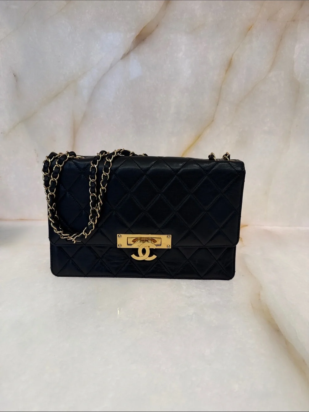CHANEL Black Quilted Leather Shoulder Bag with Gold Hardware